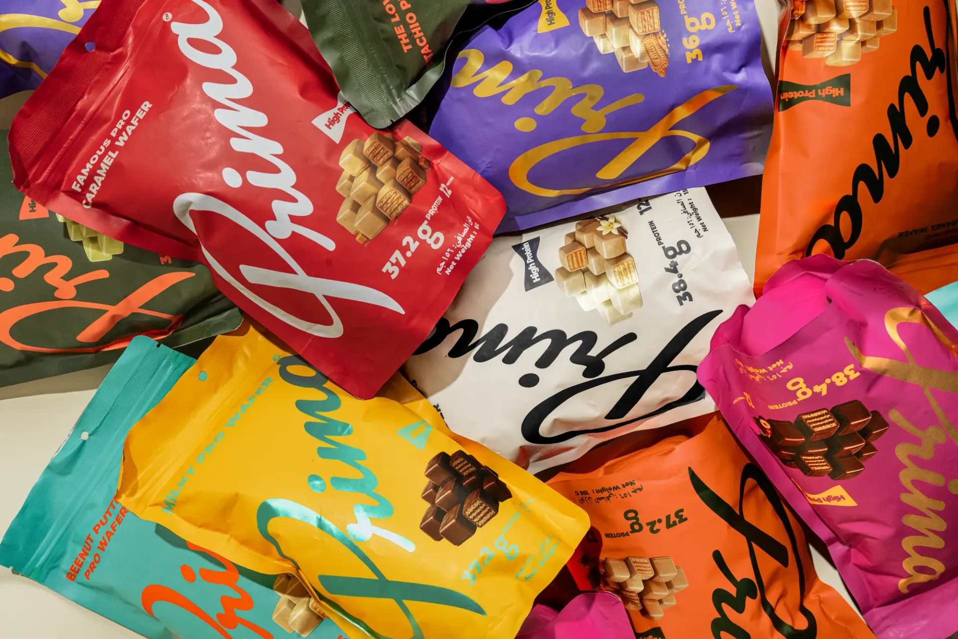 Prima pro wafer pouches piled together in every colour of the range